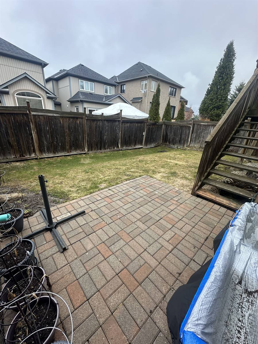 Old red paver patio before the build