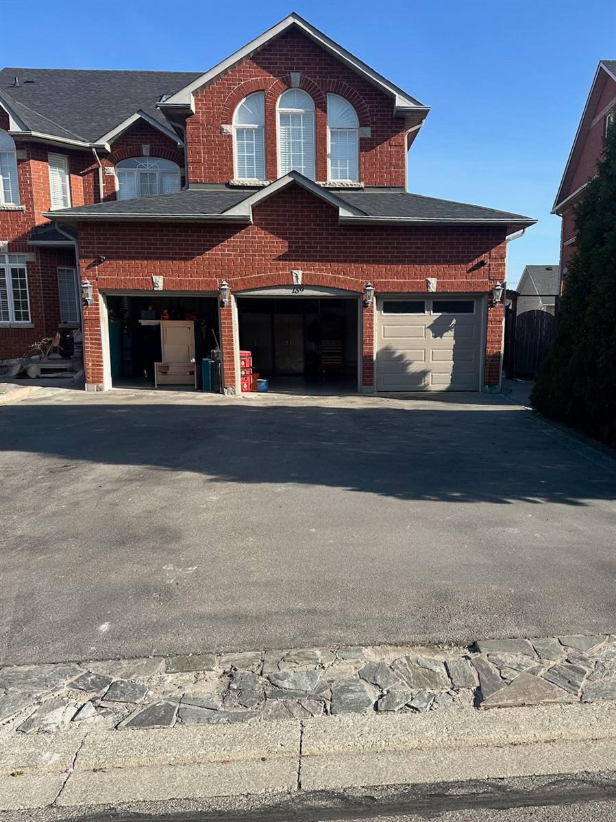 Old asphalt driveway before the rebuild